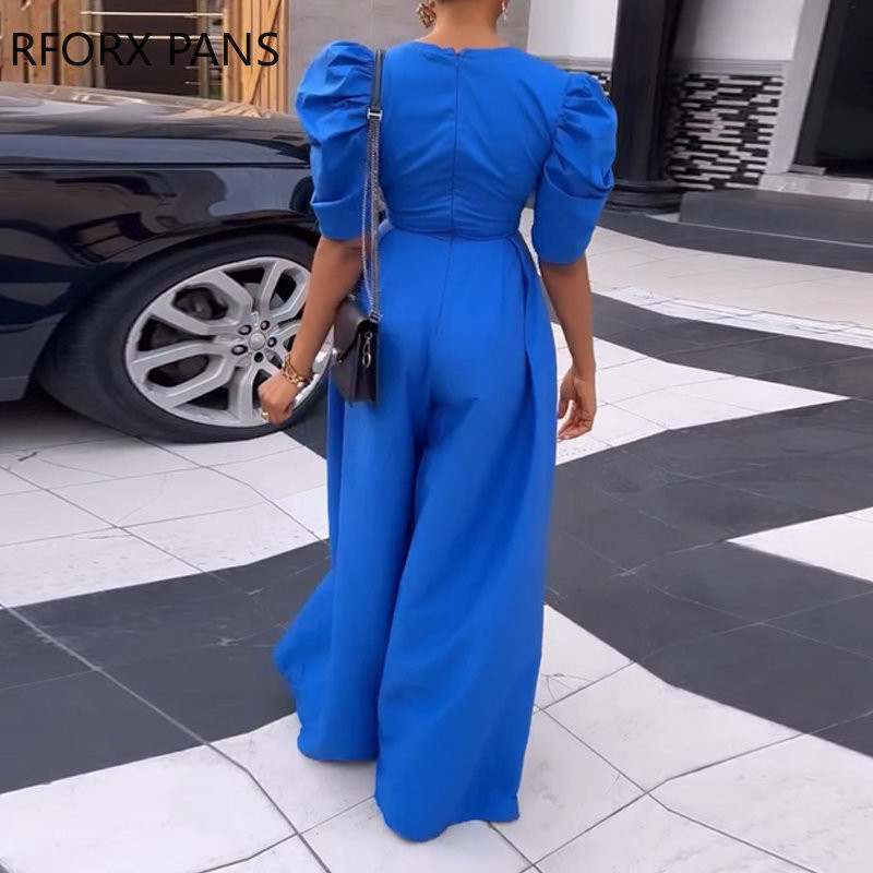 Naiste tugevad elegantsed lühikesed puhvis varrukad, sügava V-kaelusega lai jalg taskuga töötava kombinesooniga