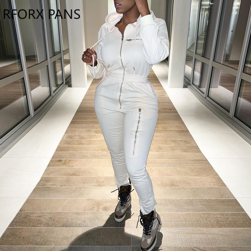 Ženski jednobojni kombinezon s kapuljačom i trakom s patentnim zatvaračem Sportski kombinezon s elastičnim strukom