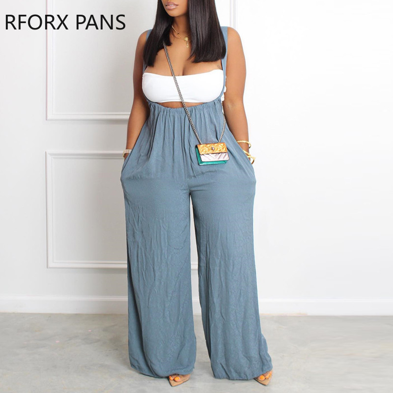 Ženski traper kombinezon sa širokim nogavicama i debelim remenom, jednobojni pastelni dekor