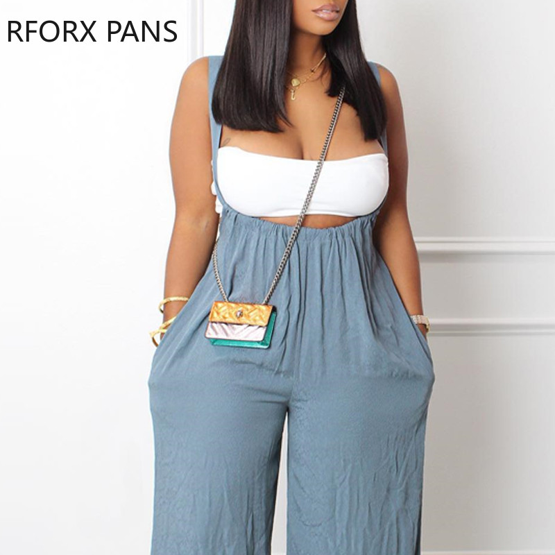 Ženski traper kombinezon sa širokim nogavicama i debelim remenom, jednobojni pastelni dekor