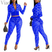 Ženska seksi majica dugih rukava s prozirnim mrežastim patentnim zatvaračem i uskim hlačama visokog struka