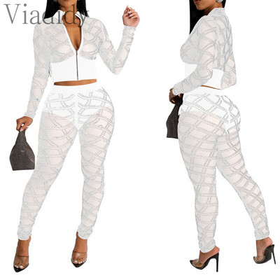 Ženska seksi majica dugih rukava s prozirnim mrežastim patentnim zatvaračem i uskim hlačama visokog struka