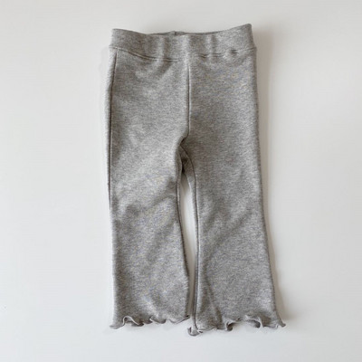 Kevadised ja sügisesed tüdrukute ühevärvilised moodsad seeneserva elastsed laienevad püksid vabaaja välispüksid