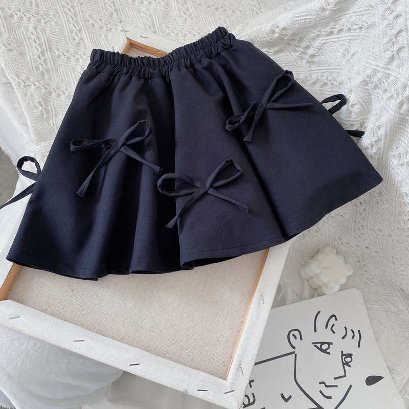 Proljetne suknje za djevojčice Nove univerzalne plisirane kilo hlače Dječja jesenska suknja sa sigurnosnim hlačama iznutra Dječje suknje s mašnama i naljepnicama