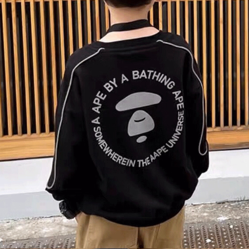 Odjeća za dječake 2023. Proljeće Novi trend pamuka Jednobojne korejske verzije s printom dugih rukava i okruglog izreza Široke modne majice