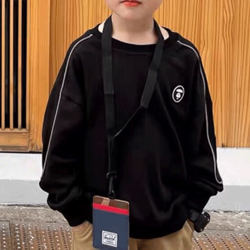 Odjeća za dječake 2023. Proljeće Novi trend pamuka Jednobojne korejske verzije s printom dugih rukava i okruglog izreza Široke modne majice