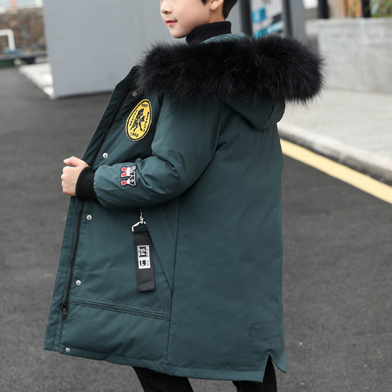 Ziemas zēnu mode Jauni mēteļi pusaudžiem dūnu jakas biezas siltas virsdrēbes bērnu apģērbi ar kapuci kažokādas apkakles zēniem garas parkas