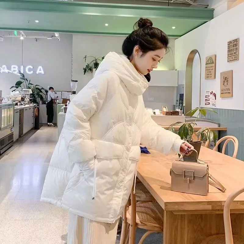 Punjasta pamučna jakna 2023. Elegantna korejska verzija široka ženska gornja odjeća srednje dužine stila Svestrana ženska gornja odjeća s kapuljačom
