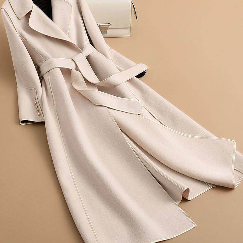 2023 m. Moterų rudens, žiemos naujos mados ir atmosferos korėjietiška versija, plonai prigludęs ir juosmens apvyniotas vilnonis dvipusis aksominis paltas