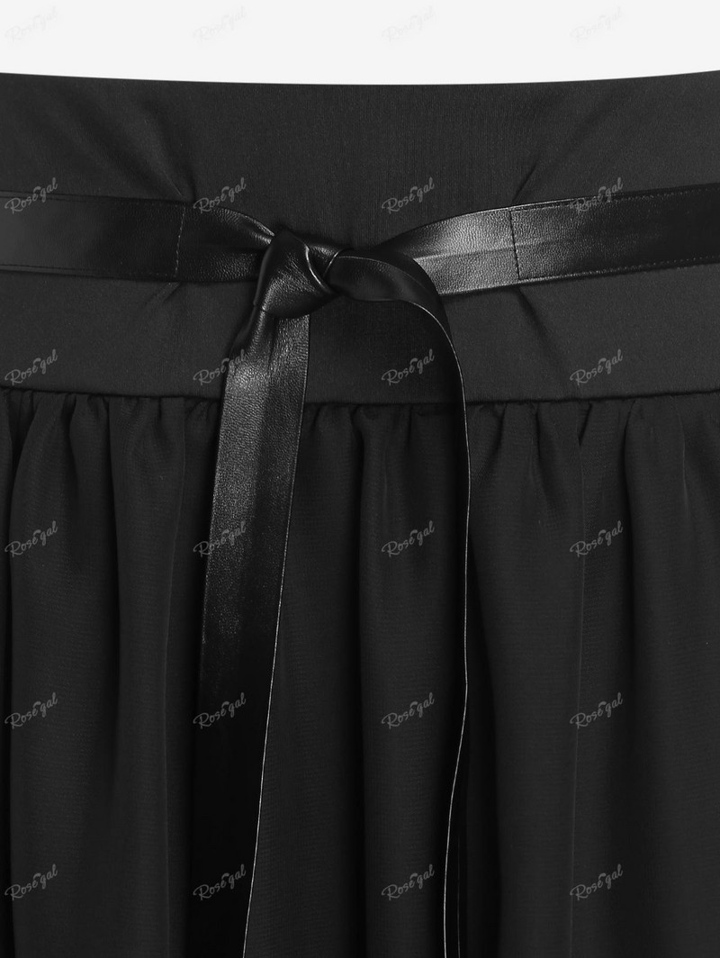 ROSEAGL Visoka niska midi suknja s PU ukrasima na izvlačenje veće veličine Ženska modna ulična odjeća Originalni dizajn suknje s elastičnim strukom crne 4XL