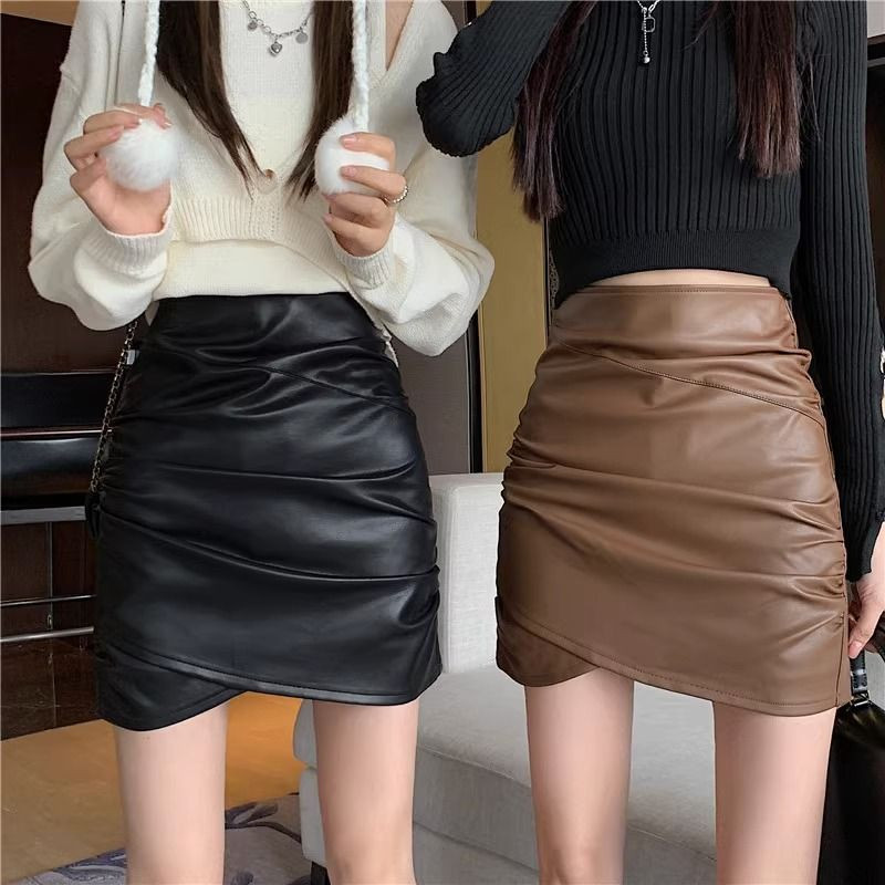 Nepravilna suknja od pu kože Ženske seksi mini suknje visokog struka Jesen Zima Nova crna ležerna kratka suknja A kroja N27