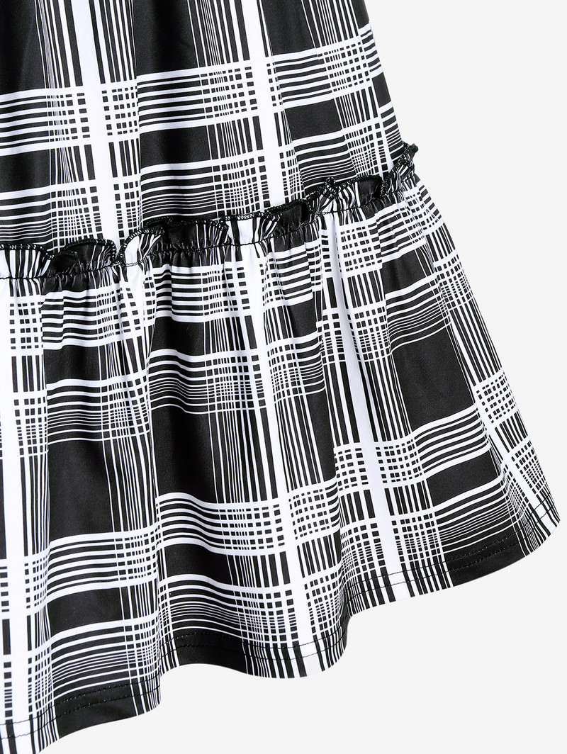 ROSEGAL Plus Size kockovaná volánová midi sukňa A strihu 2023 letná móda čiernobiela rozšírená sukňa s elastickým pásom 4XL