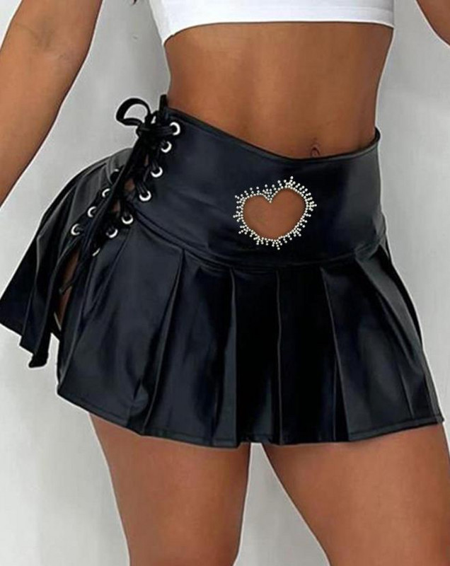 Nova moda 2023. Ljeto, ležerna seksi plisirana mini suknja od pu kože s ušicama i ušicama, ženski donji dio