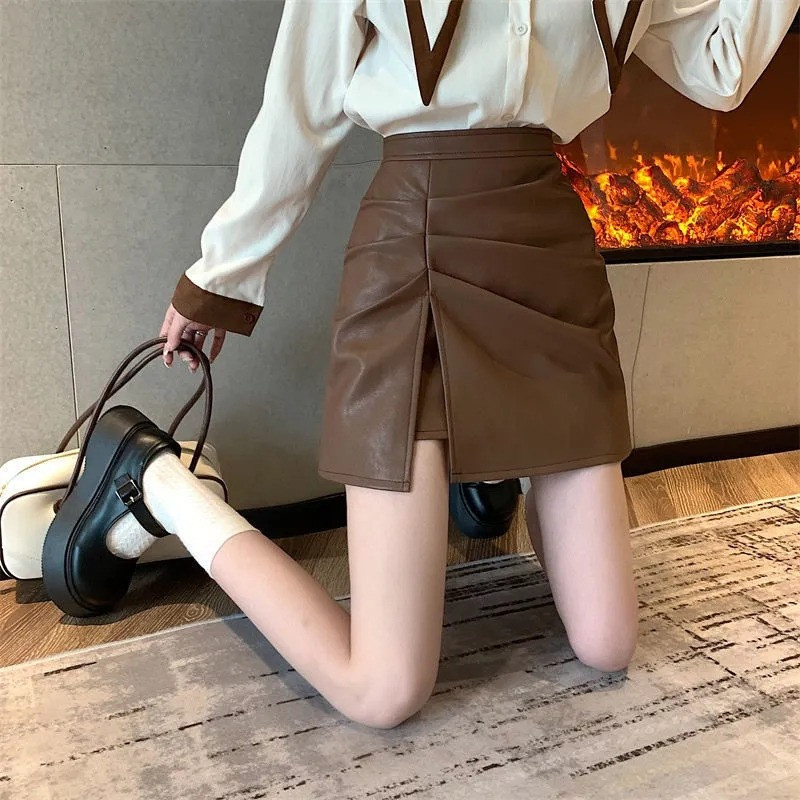 Fusta din piele PU plisată cu fărâmițare Fusta scurtă cu linie A pentru femei Pure Desire American Spicy Girl Moda coreeană cu talie înaltă