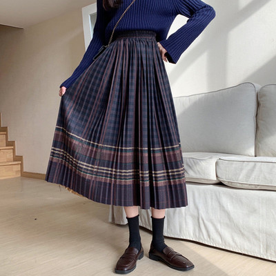 Retro vilnonis languotas sijonas rudens ir žiemos moterų tarpukojis aukštu juosmeniu yra plonesnis vidutinio ilgio etninio stiliaus klostuotas A formos sijonas