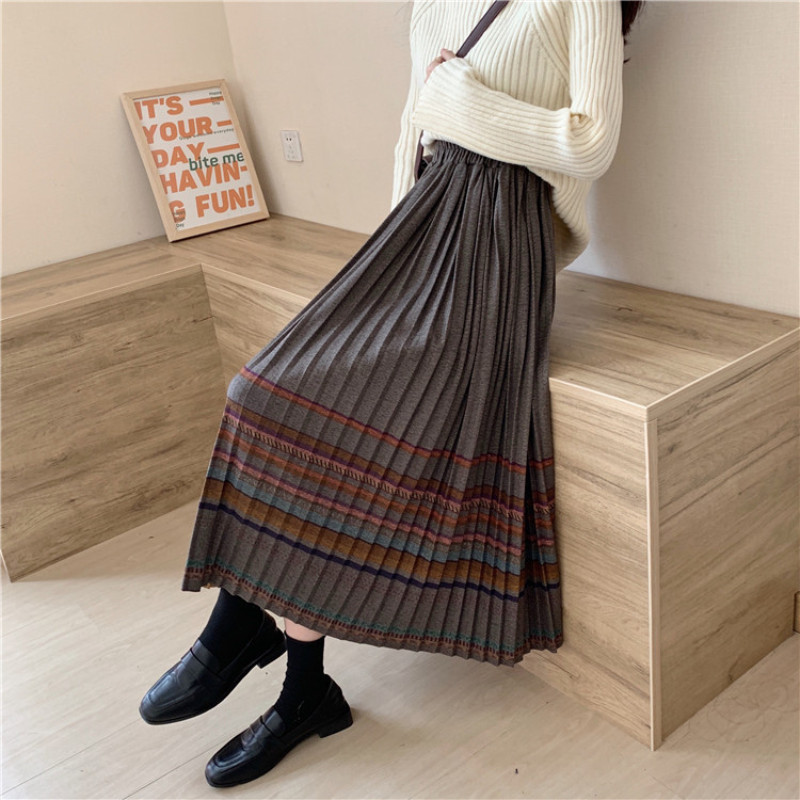 Retro vilnonis languotas sijonas rudens ir žiemos moterų tarpukojis aukštu juosmeniu yra plonesnis vidutinio ilgio etninio stiliaus klostuotas A formos sijonas