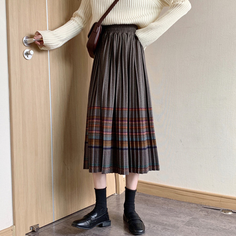 Retro vilnonis languotas sijonas rudens ir žiemos moterų tarpukojis aukštu juosmeniu yra plonesnis vidutinio ilgio etninio stiliaus klostuotas A formos sijonas