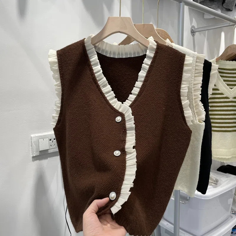 Σχεδιασμός Ξύλινα Αυτιά Πλεκτά Γιλέκα Γυναικεία Κορεάτικη Μόδα Πουλόβερ με μαργαριτάρια με κουμπιά Αμάνικη ζακέτα Ανοιξιάτικα πλεκτά γιλέκα