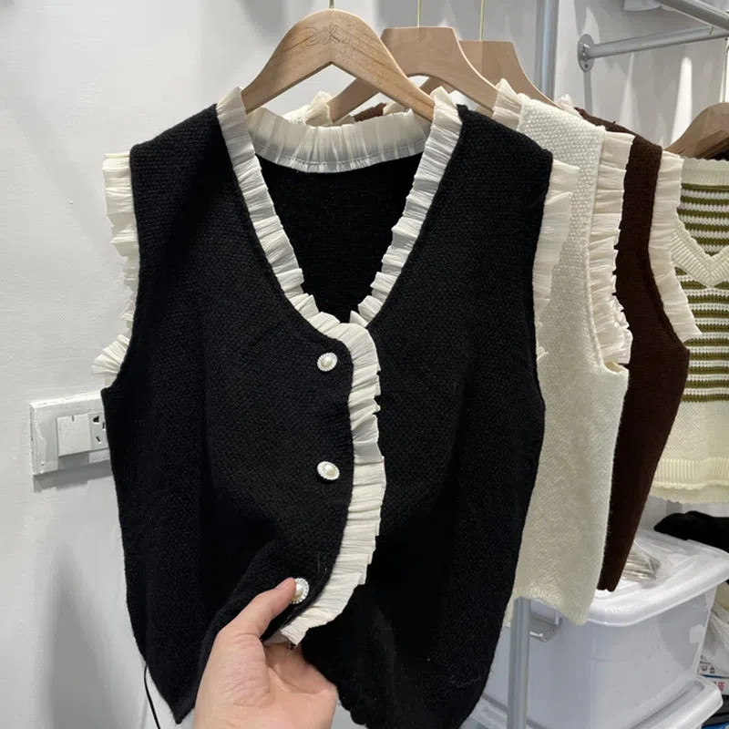 Σχεδιασμός Ξύλινα Αυτιά Πλεκτά Γιλέκα Γυναικεία Κορεάτικη Μόδα Πουλόβερ με μαργαριτάρια με κουμπιά Αμάνικη ζακέτα Ανοιξιάτικα πλεκτά γιλέκα