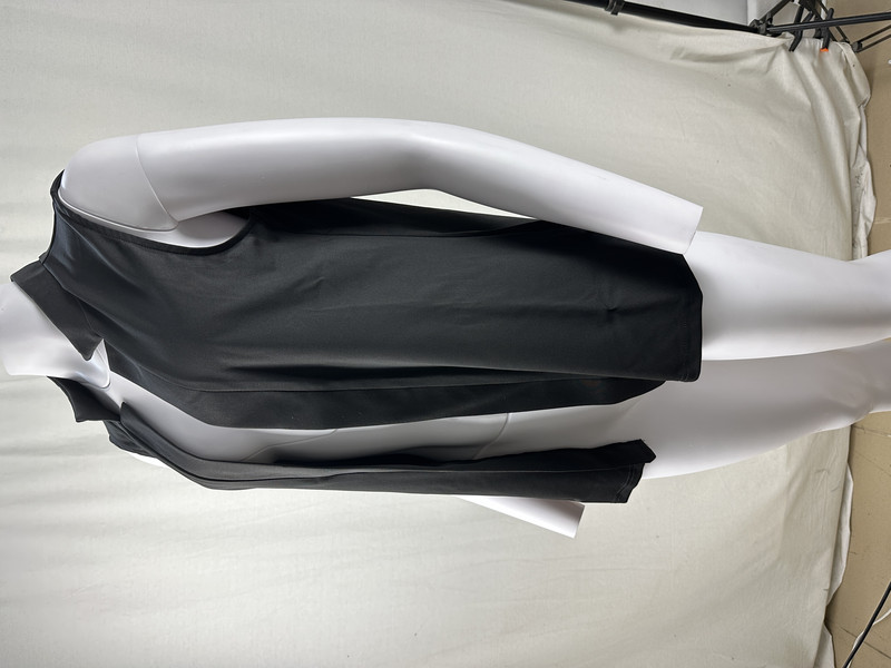 Ljetna prekogranična trgovina nove Europe i Sjedinjenih Država ženskog temperamentnog kardigana od jednobojnog prsluka