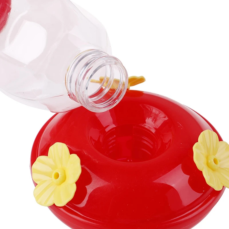 Hrănitor pentru păsări pentru flori în aer liber cu cârlig de fier Sticlă de plastic pentru adăpători de apă pentru păsări Hrănitor pentru colibri agățat pentru grădină.