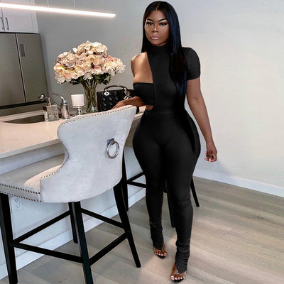 Įprastas, vieno peties mezgimo šonkauliuku moteriškas kombinezonas Seksualus tuščiaviduris trumpomis rankovėmis perpjautas apvadas platėjančios kelnės Plonas kombinezonas moterims