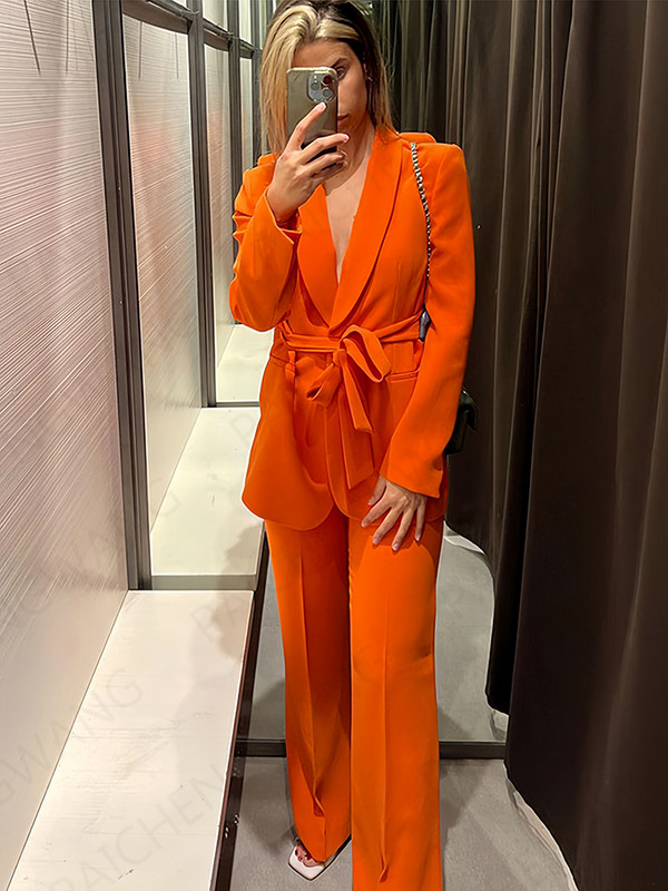 Dámsky oblek s dlhým rukávom a úzkym zapínaním na jeden gombík, oranžový oblek, ležérne nohavice, čisto farebné nohavice s vysokým pásom a širokými nohavicami