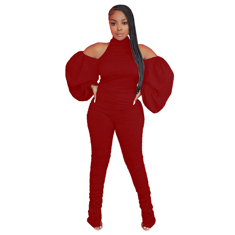 Ulični kombinezon s halterima bez leđa, s naborima, spuštenih ramena, dugih rukava, donjeg dijela kombinezona, široke zvonaste hlače s podijeljenim rukavima