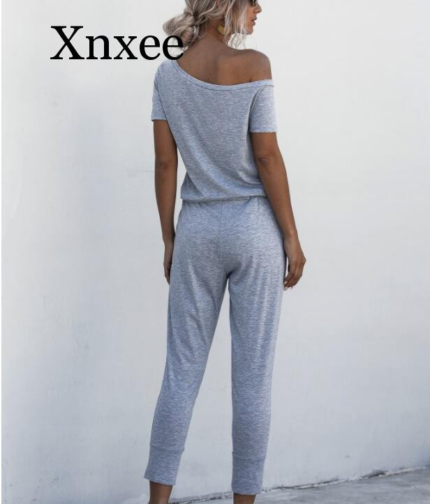 Ljeto Jedno rame Džepovi na vezanje Duge hlače Seksi kombinezon Ženski kratki rukavi Ležerna odjeća Ulična odjeća Kombinezoni za plažu