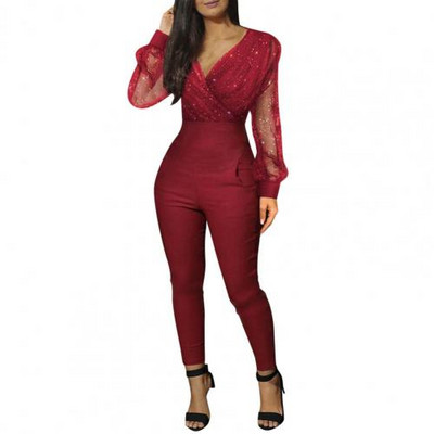 Ženski jednodijelni kombinezon s dubokim V izrezom i dugim rukavima sa šljokicama