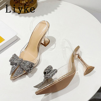 Liyke Елегантни дамски парти сватбени обувки Модни кристални пеперуди с високи токчета Секси остри пръсти PVC прозрачни помпи Сандали Дамски