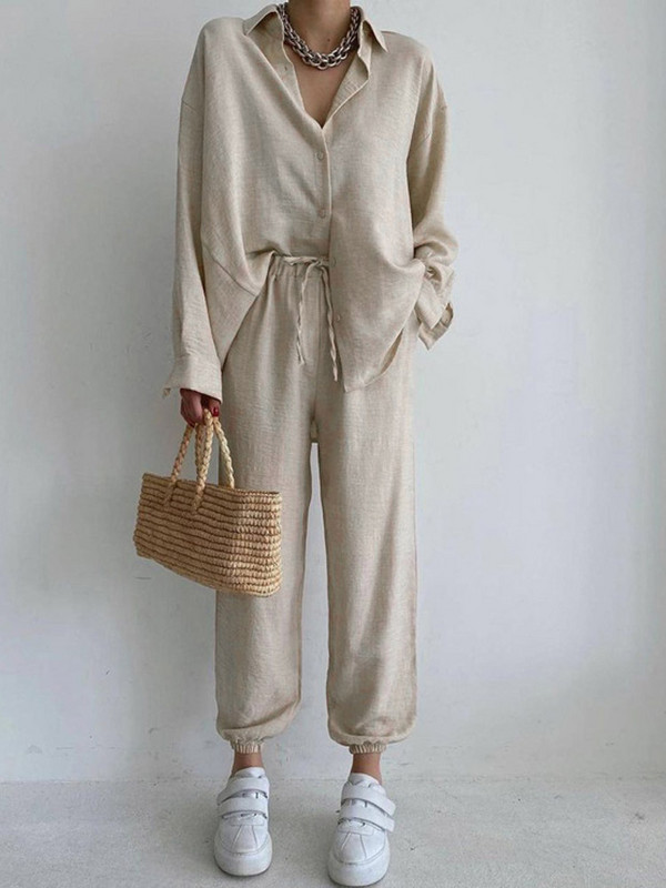 Ocazional ținută pentru femei, cu un singur piept, cu guler răsturnat, cămăși cu mânecă lungă și pantaloni harem cu dantelă elastică.