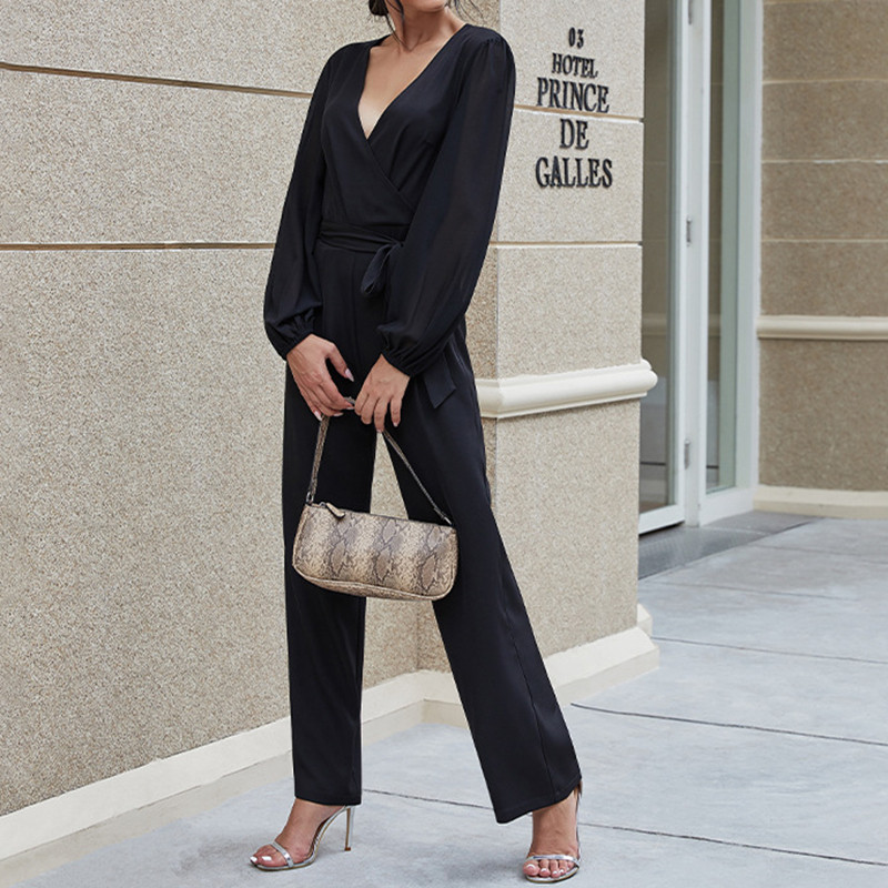 Dámsky sexy overal s hlbokým výstrihom do V, vysokým pásom, opaskom a dlhým rukávom, zaväzovaním v páse, priliehavým rukávom, formálnym večerným overalom