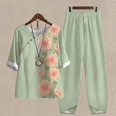 Ljetni dvodijelni kompleti Ženska odjeća O izrez Cvjetni print Široka košulja kratkih rukava Odijelo s hlačama visokog struka 2023.