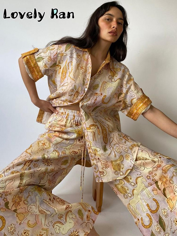 Moodsad Unicorn Print pikkade pükste komplektid Naiste vabaaja lühikeste varrukatega pluussärgid lahtised laia säärega püksid, kaheosaline komplekt suvekomplektid