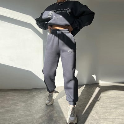 Soe kostüüm sügistalvine naiste soliidne komplekt Elegantne O-kaelusega pullover kapuuts ja taskupüksid kaheosaline komplekt Naiste vabaaja komplektid