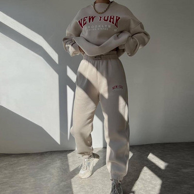 Soe kostüüm sügistalvine naiste soliidne komplekt Elegantne O-kaelusega pullover kapuuts ja taskupüksid kaheosaline komplekt Naiste vabaaja komplektid