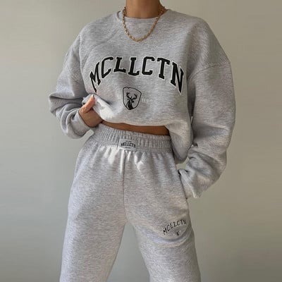 Soe kostüüm sügistalvine naiste soliidne komplekt Elegantne O-kaelusega pullover kapuuts ja taskupüksid kaheosaline komplekt Naiste vabaaja komplektid