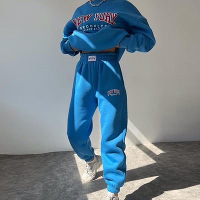 Soe kostüüm sügistalvine naiste soliidne komplekt Elegantne O-kaelusega pullover kapuuts ja taskupüksid kaheosaline komplekt Naiste vabaaja komplektid