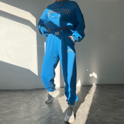 Soe kostüüm sügistalvine naiste soliidne komplekt Elegantne O-kaelusega pullover kapuuts ja taskupüksid kaheosaline komplekt Naiste vabaaja komplektid