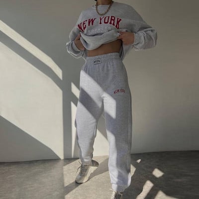 Soe kostüüm sügistalvine naiste soliidne komplekt Elegantne O-kaelusega pullover kapuuts ja taskupüksid kaheosaline komplekt Naiste vabaaja komplektid