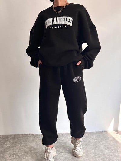 Soe kostüüm sügistalvine naiste soliidne komplekt Elegantne O-kaelusega pullover kapuuts ja taskupüksid kaheosaline komplekt Naiste vabaaja komplektid