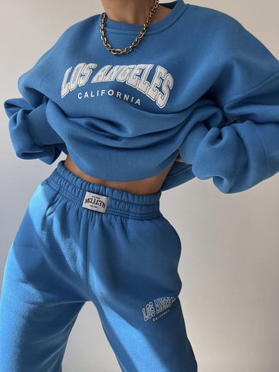 Soe kostüüm sügistalvine naiste soliidne komplekt Elegantne O-kaelusega pullover kapuuts ja taskupüksid kaheosaline komplekt Naiste vabaaja komplektid