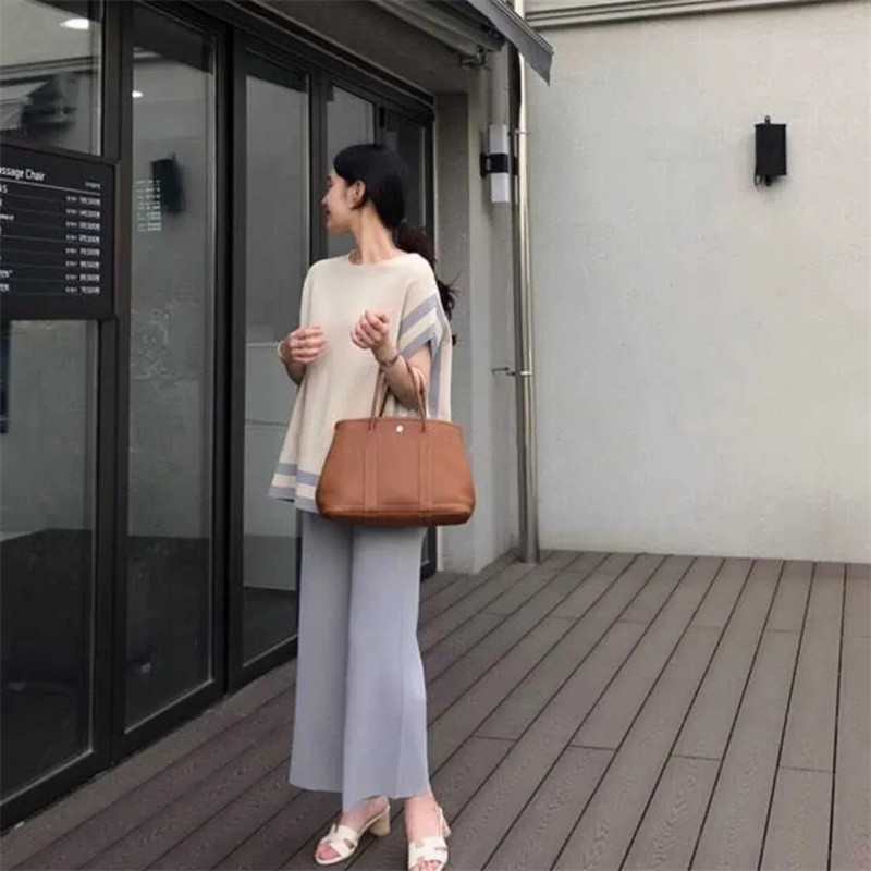 2022. aasta moe suve naiste jääsiidist õhuke silmkoeline varrukateta pullover Kaheosalised pükskostüümid + kõrge vöökohaga, laia säärega pükste komplektid