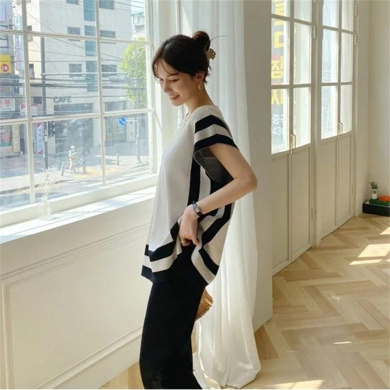 2022. aasta moe suve naiste jääsiidist õhuke silmkoeline varrukateta pullover Kaheosalised pükskostüümid + kõrge vöökohaga, laia säärega pükste komplektid