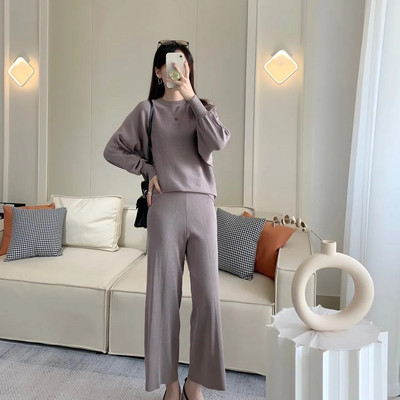 Νέα μόδα σετ δύο τεμαχίων Γυναικεία παντελόνια με ψηλό γιακά επάνω φαρδιά ποδαρικά ρούχα casual φαρδιά κοστούμια φθινοπωρινά πλεκτά σετ παντελονιών με ραβδώσεις 2023