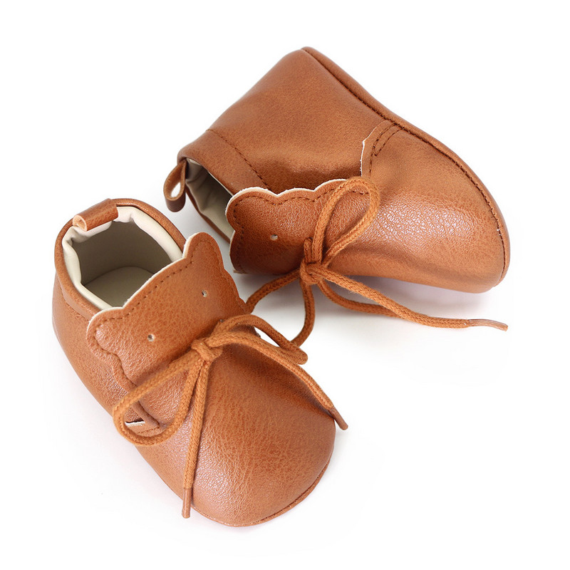 Νέα δερμάτινα παπούτσια για μωρά PU Unisex με μαλακή σόλα με κορδόνια για νεογέννητα παιδικά παπούτσια για κοριτσάκια First Walkers Retro casual για αγόρια