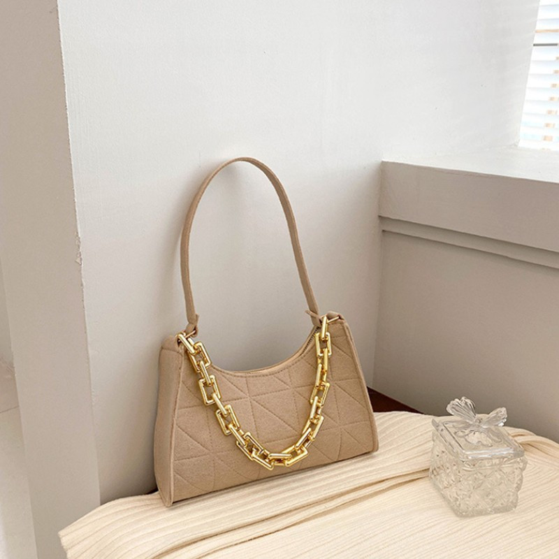 2023. aasta uus mood naiste ketiga õlakotid, vildist PU-nahast ühevärviline kaenlaaluse kott Naiste lihtsad vabaaja kivimustriga käekotid