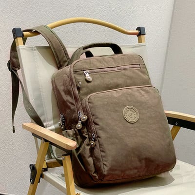 Új divatos, nagy kapacitású hátizsák nőknek Nylon vízálló alkalmi férfi hátizsák Könnyű női laptoptáska