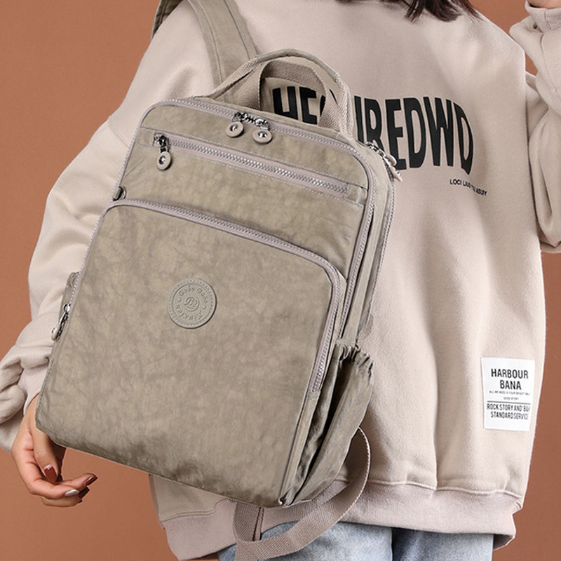 Új divatos, nagy kapacitású hátizsák nőknek Nylon vízálló alkalmi férfi hátizsák Könnyű női laptoptáska